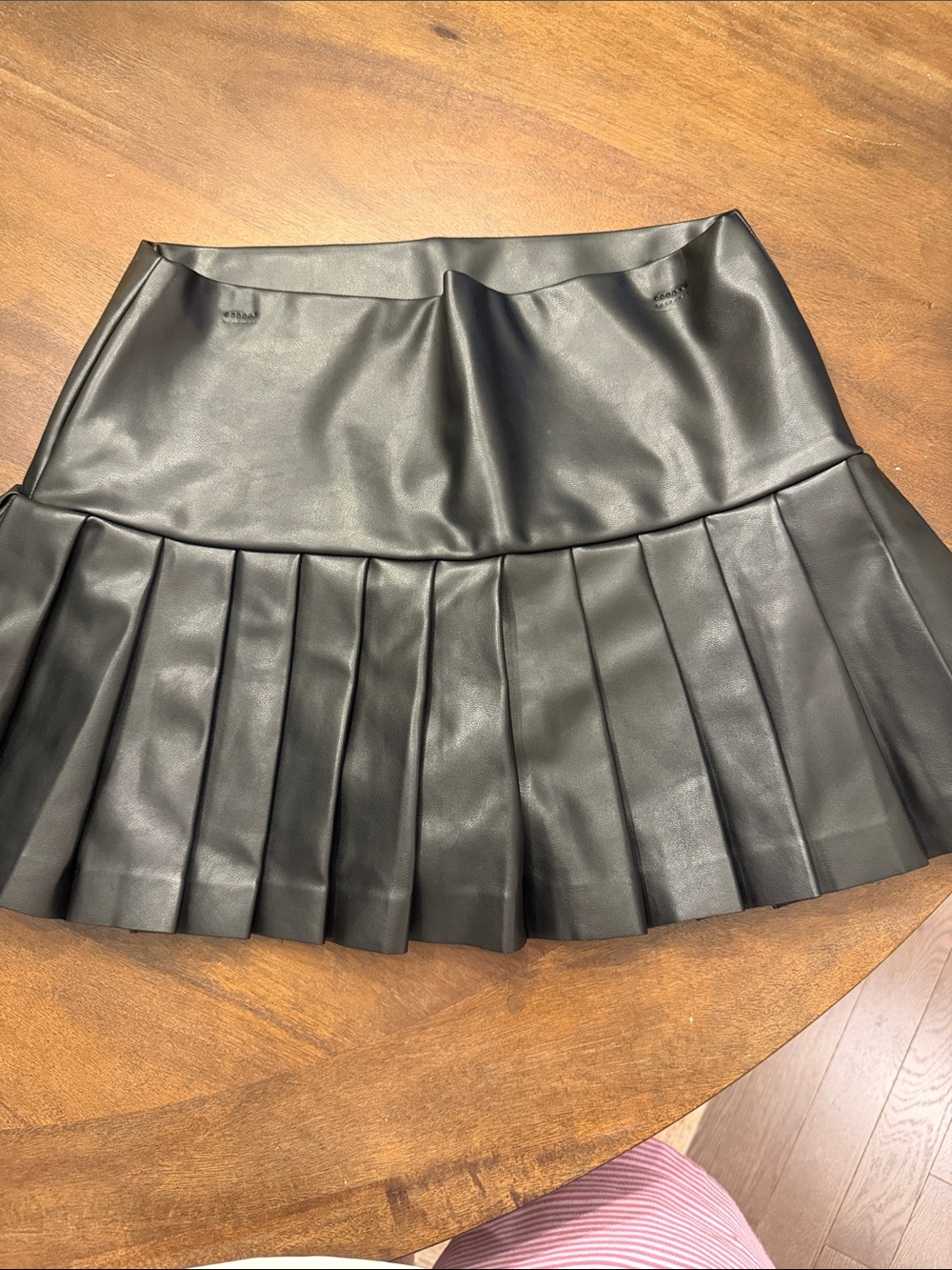 Norma Kamali Black Pleated Faux Leather Mini Skirt